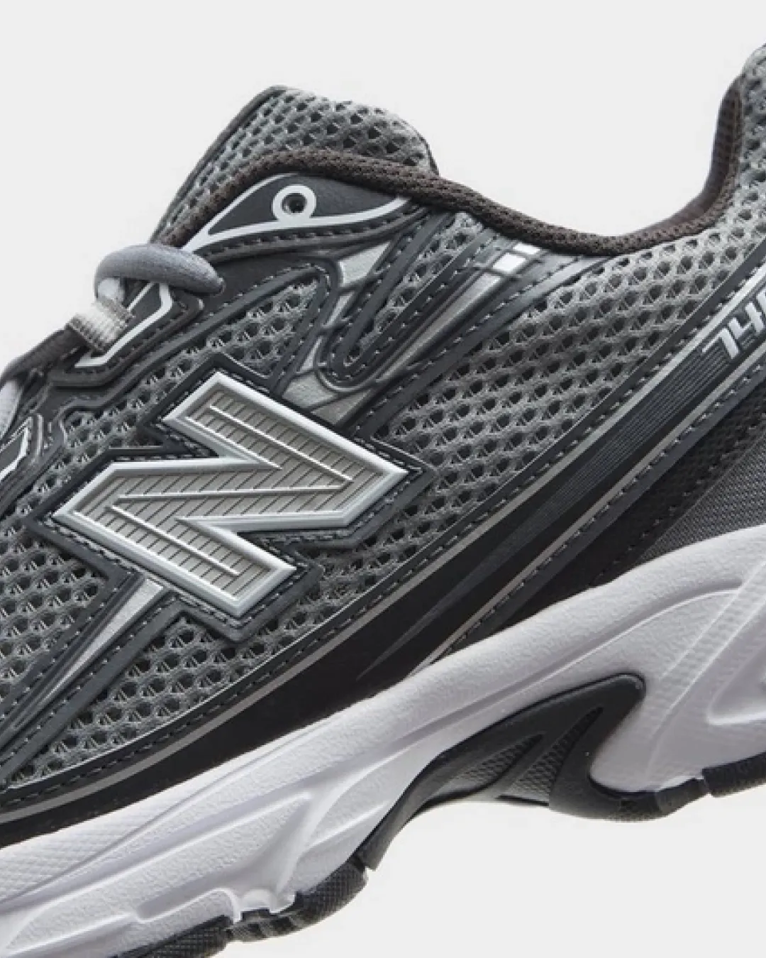 New Balance 740 in Dark Grey and Silver